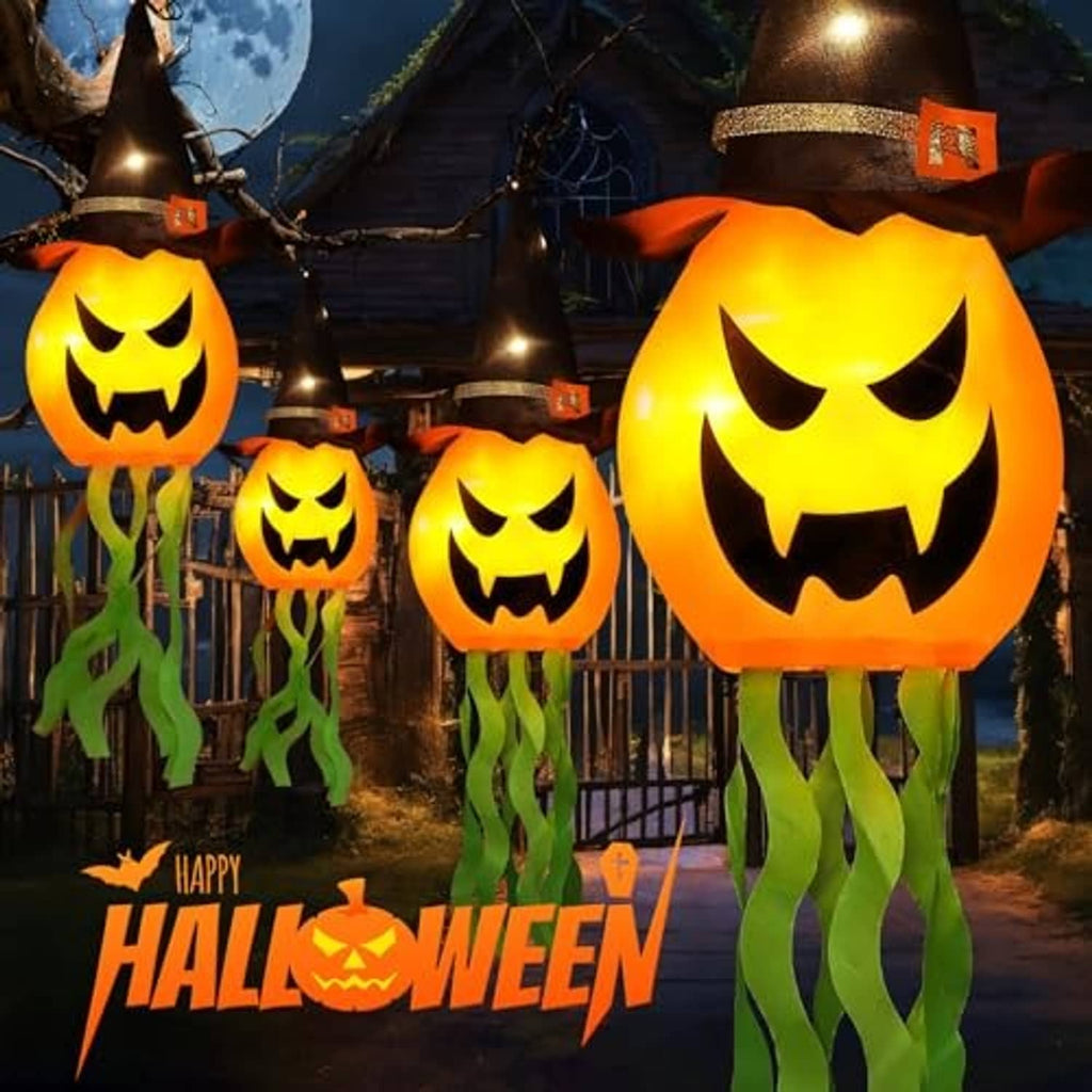 Glowing jack-o’-lantern hanging lights with witch hats and green tentacle streamers