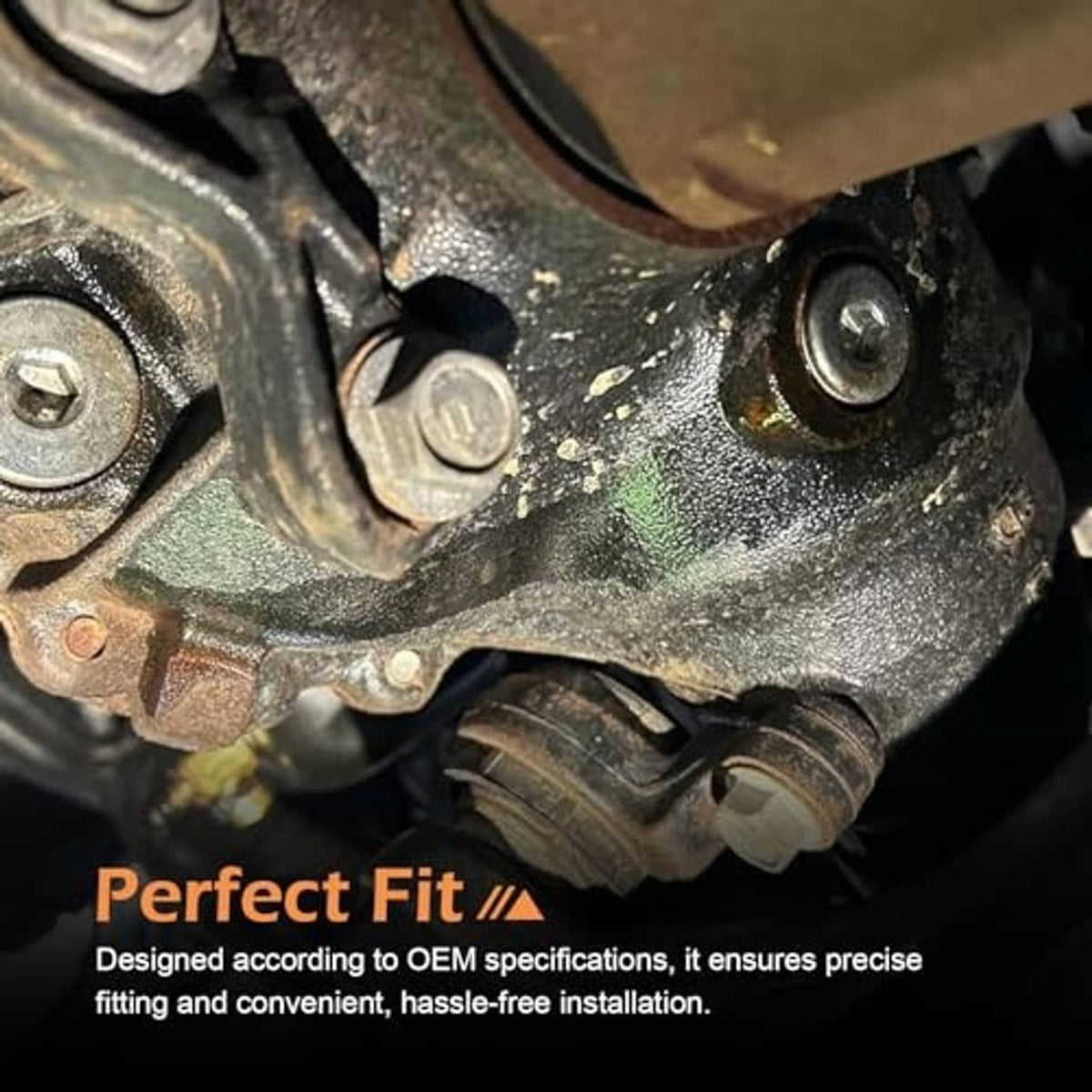 Copper and silver gasket near transmission case drain bolts in close-up