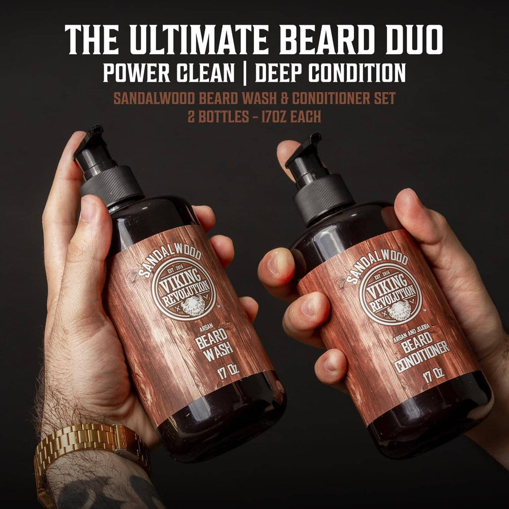 Viking Revolution Sandalwood beard wash and conditioner bottles held in hands