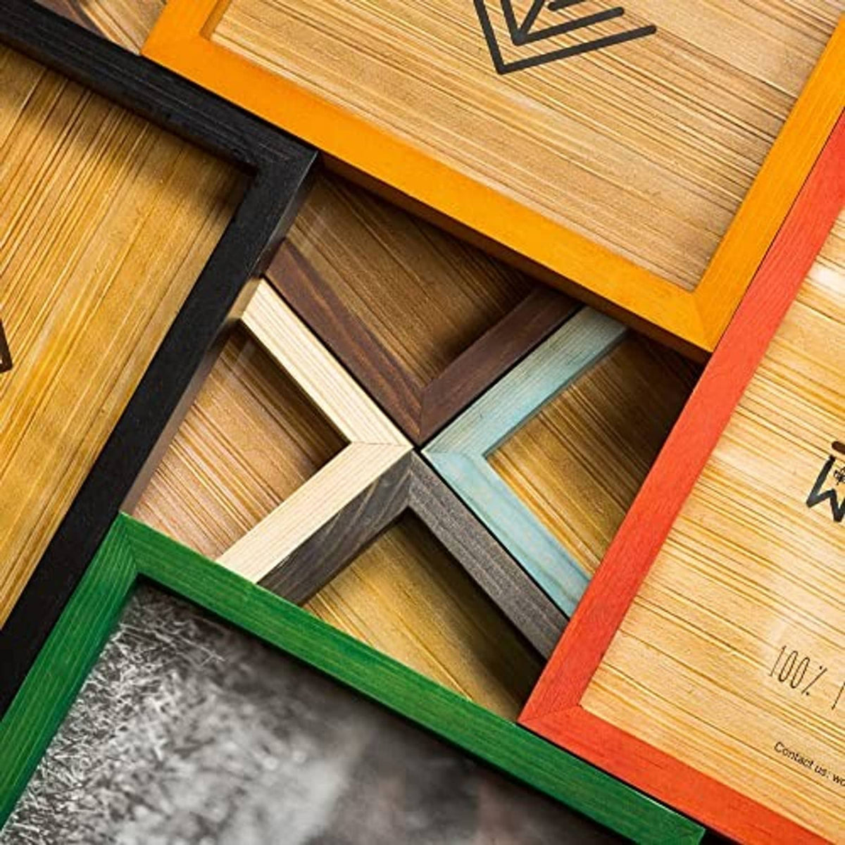Wooden poster frames stacked with colored borders and natural wood centers