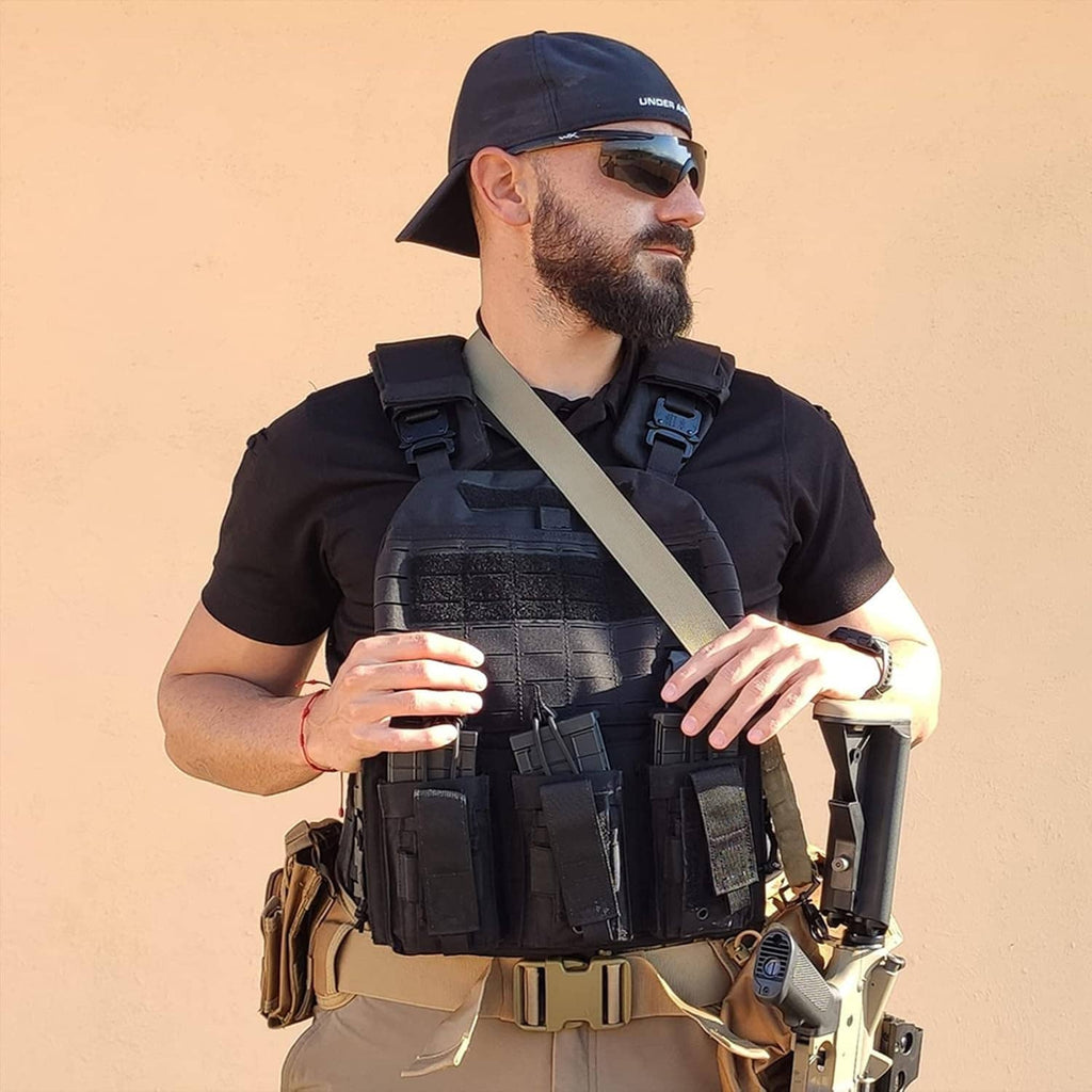 Black tactical belt with front magazine pouches and adjustable shoulder-to-belt straps