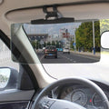 Universal car sun visor extender with dark tinted panel and dashboard clip mount