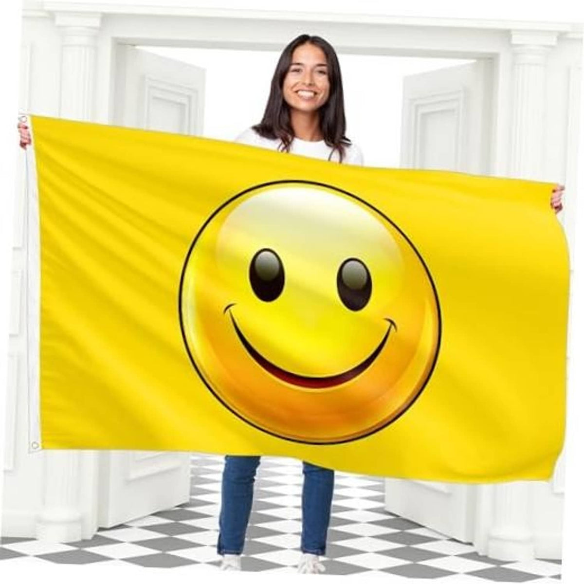 Yellow smiley face flag with large grin print, held up by a person outdoors indoors