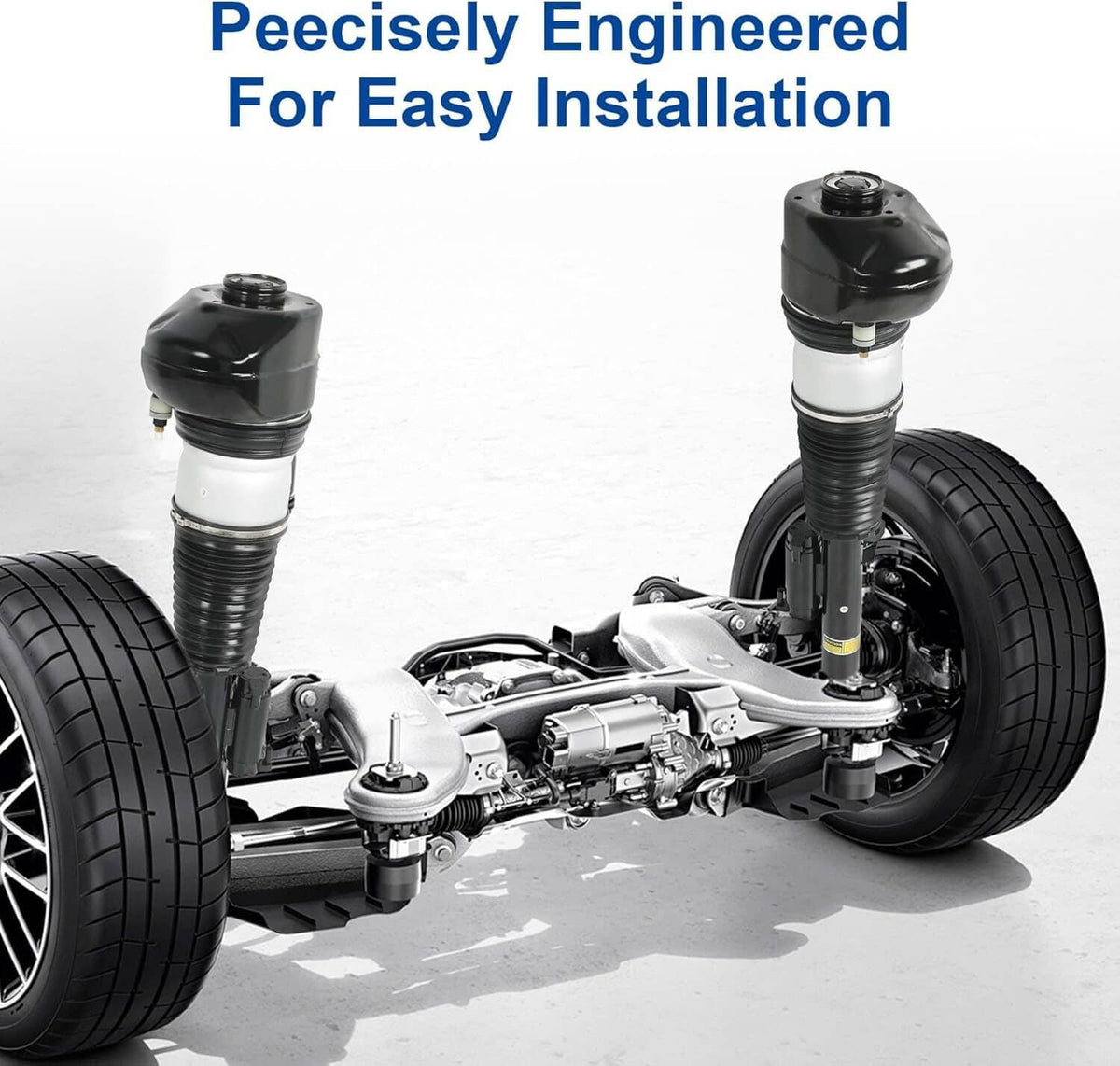 Air suspension strut pair installed under a vehicle, showing upper mounts