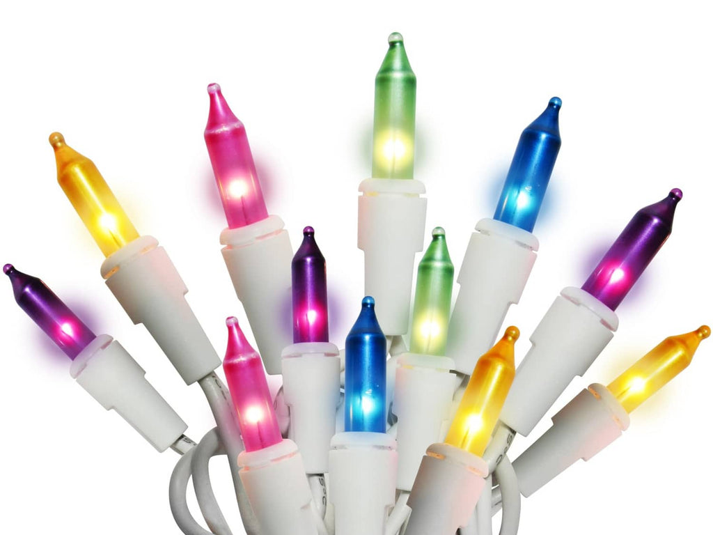 Pastel mini bottle string lights with multicolor bulbs glowing on a white base
