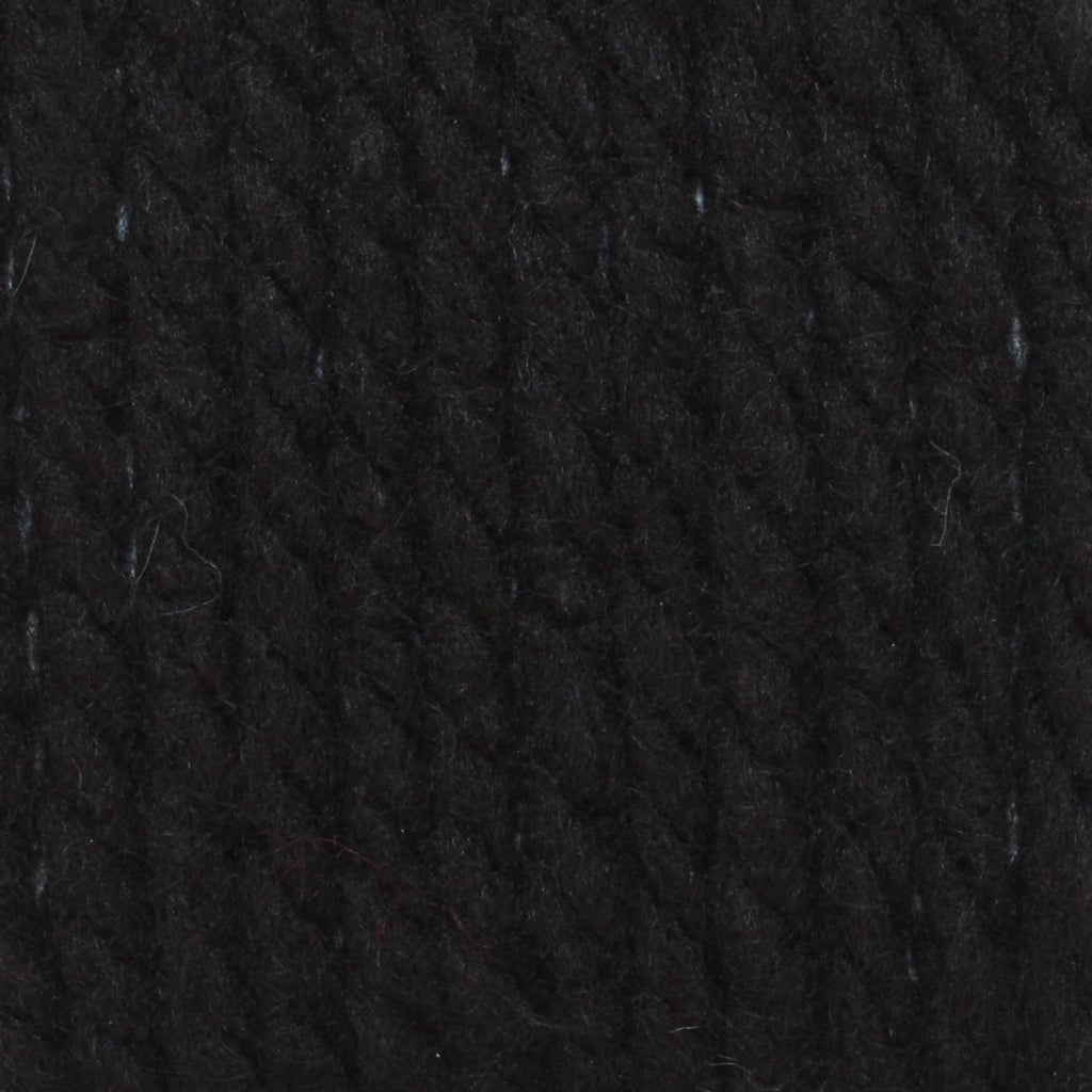 Dark black chunky yarn texture close-up