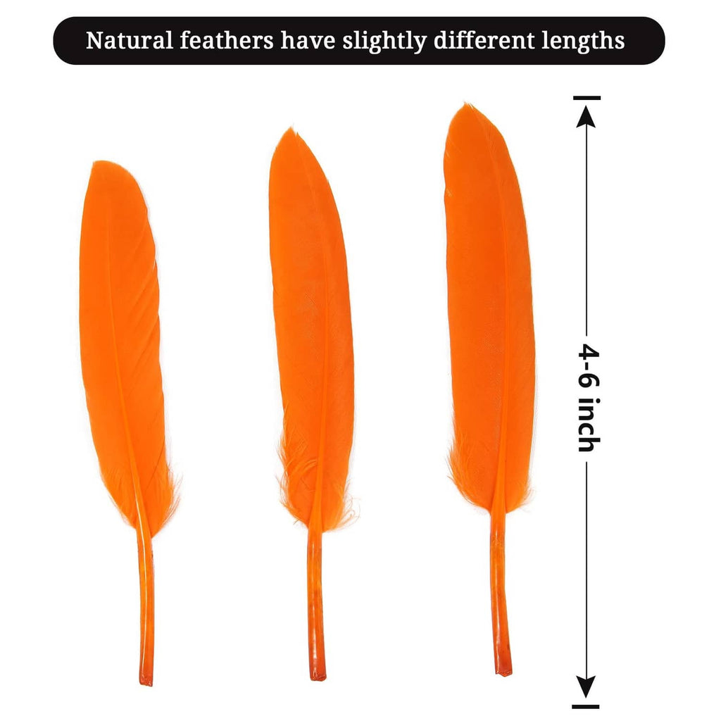 Orange goose feathers, three loose plumes with long quills, ~4–6 in