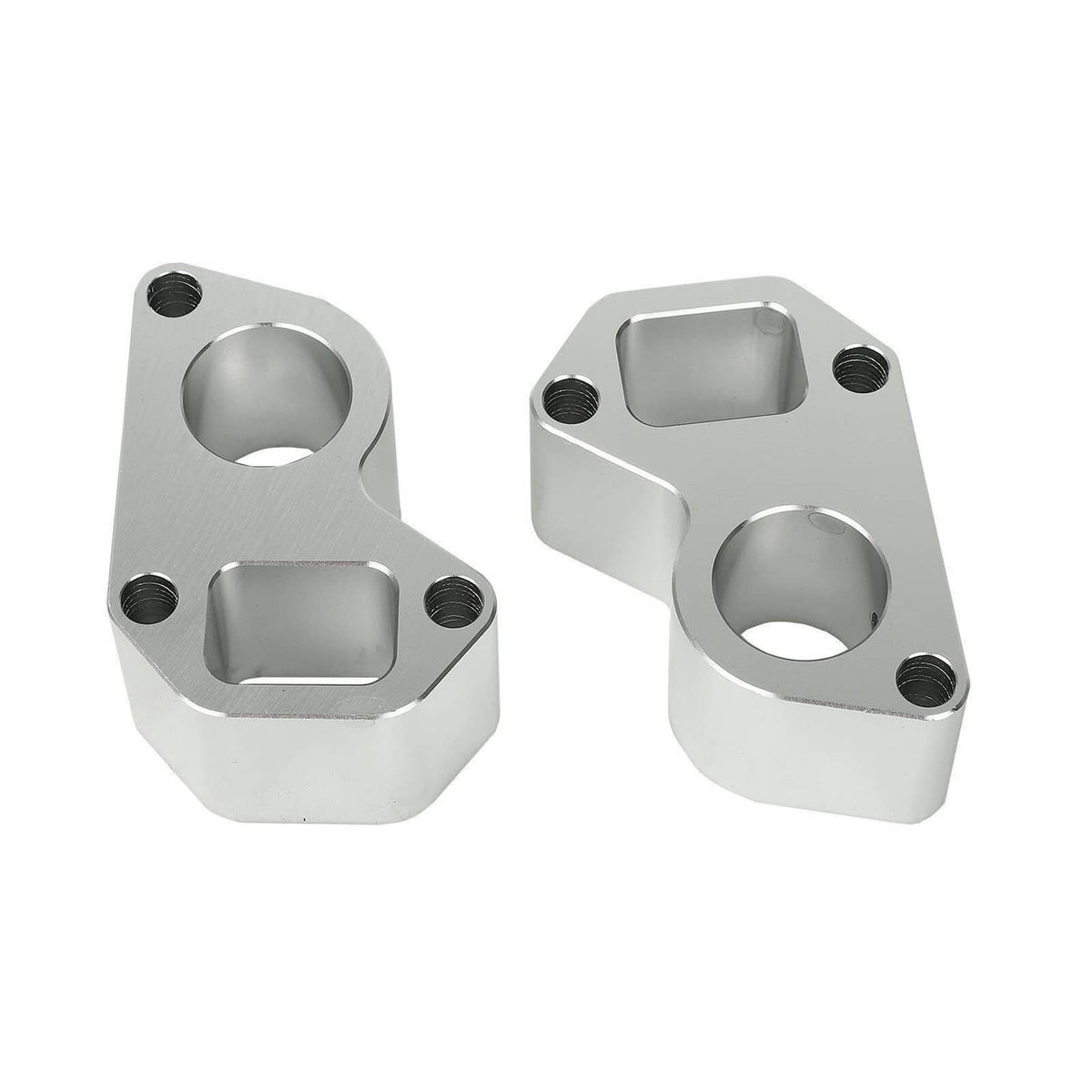 Pair of silver water pump spacer blocks with circular openings and threaded bolt holes