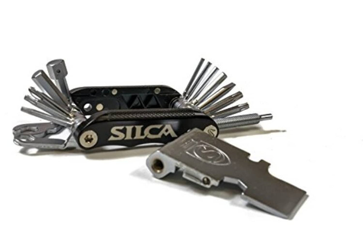 SILCA multi-tool with black handle, extended tools including screw/hex tools and wrenches