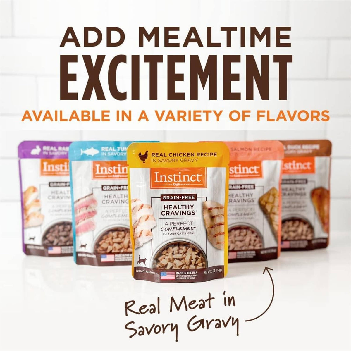 Assorted grain-free cat food topper pouches shown in multiple flavors