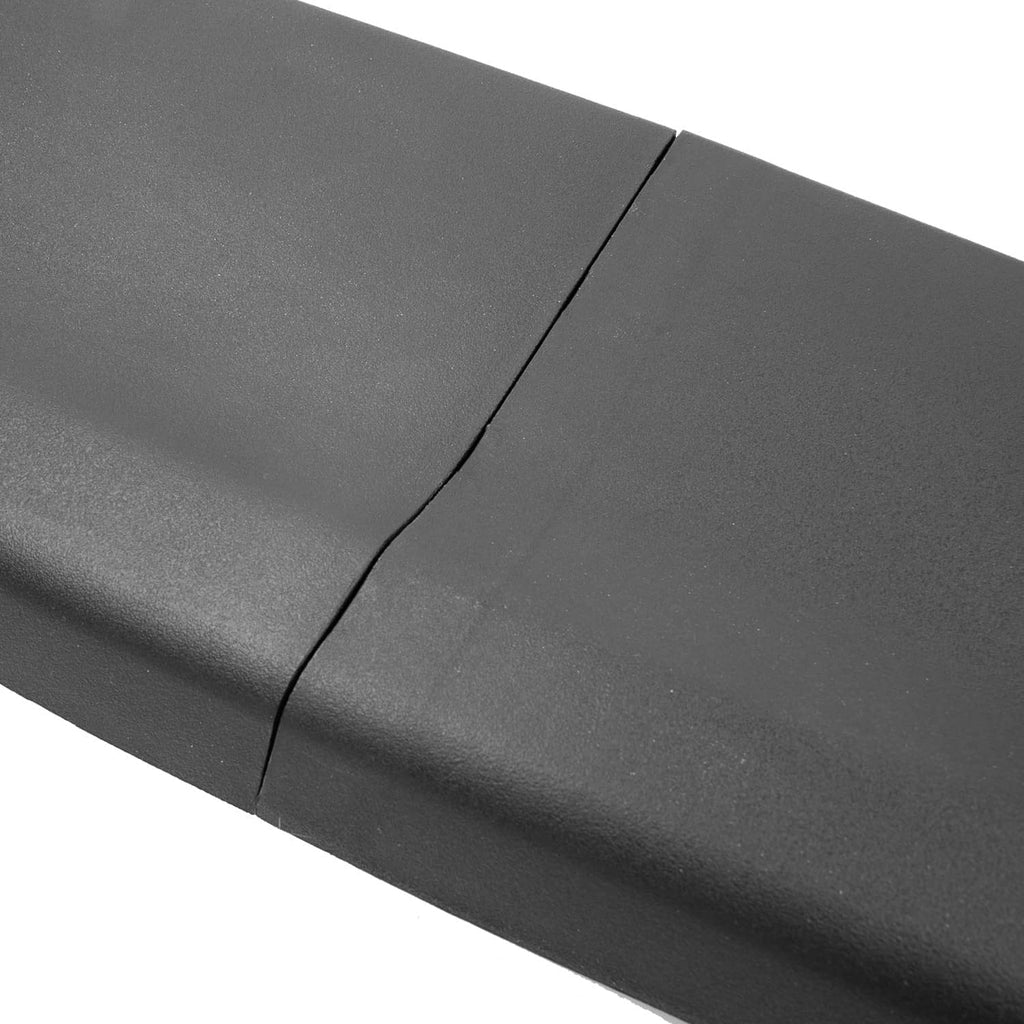 Close-up of dark gray/black tailgate cover molding spoiler seam and texture