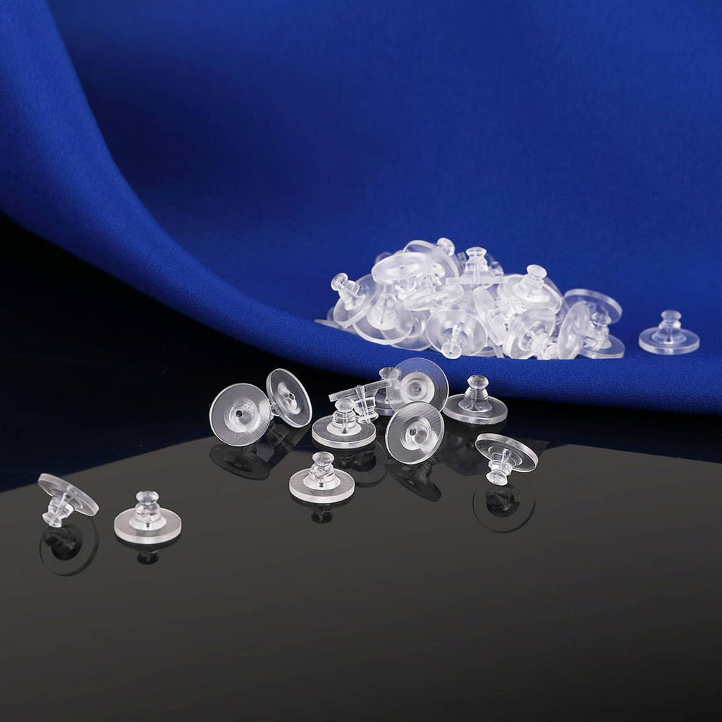 Clear silicone snap-on earring backs set, round discs with central posts for studs