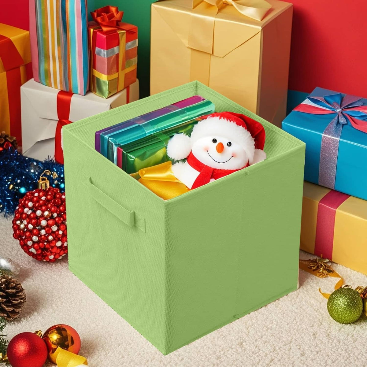Green foldable storage cube with front pull handle holding holiday plush items