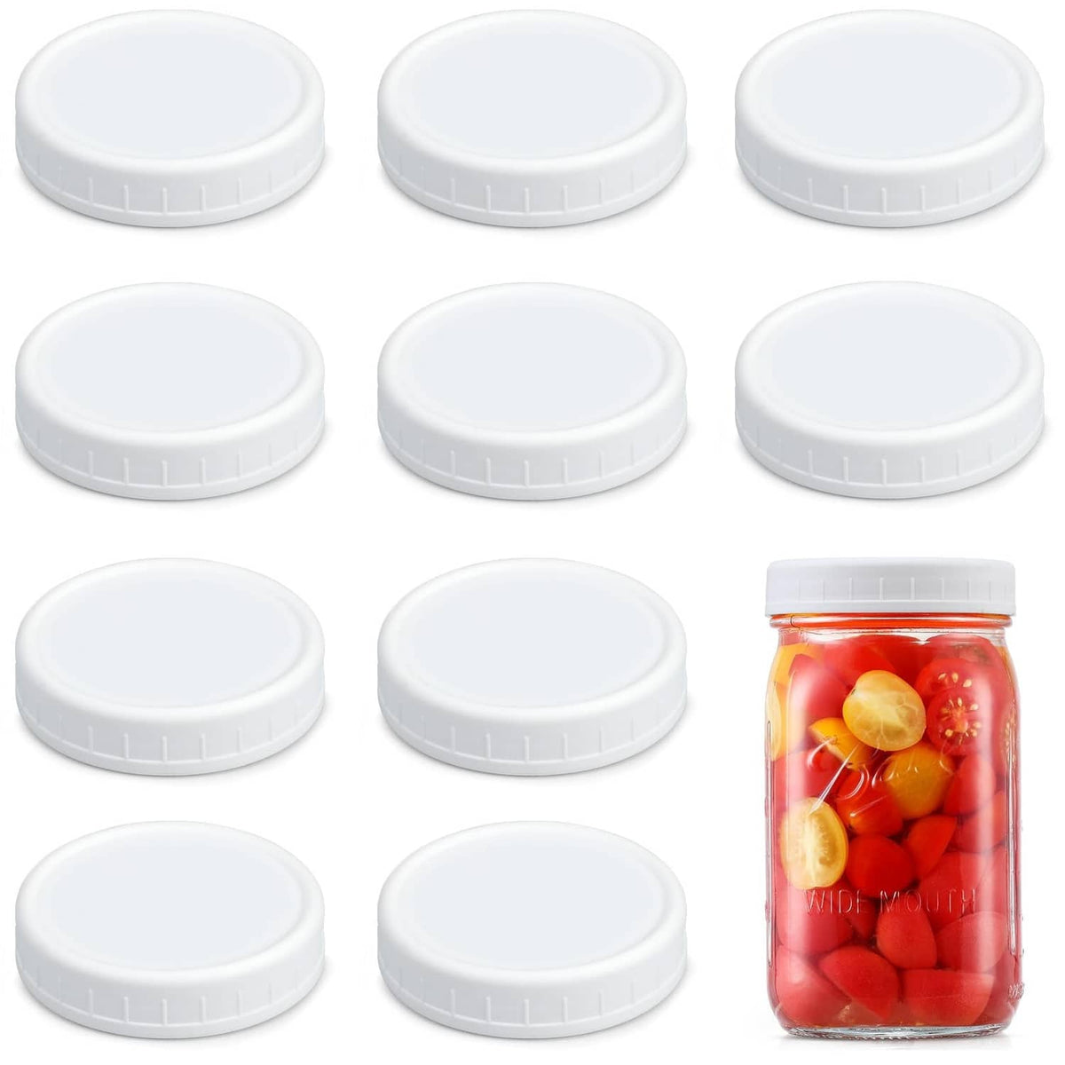 Set of white wide-mouth mason jar lids with one lid on a jar