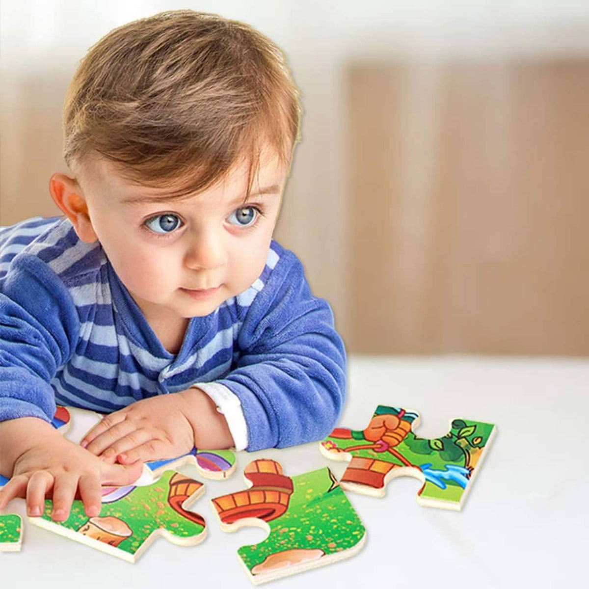 Young child playing with an animal jigsaw puzzle, placing colorful pieces