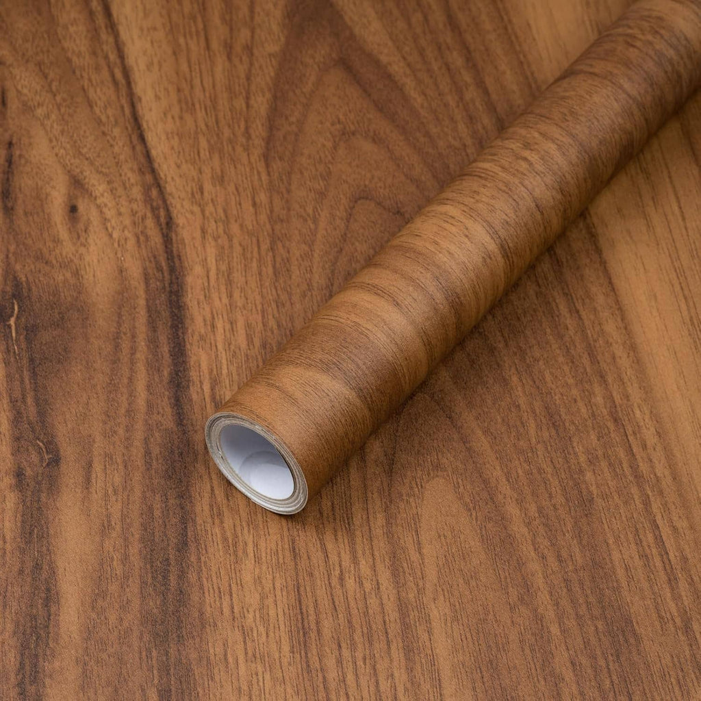 Peel-and-stick wood grain contact paper roll with backing edge, brown wood pattern