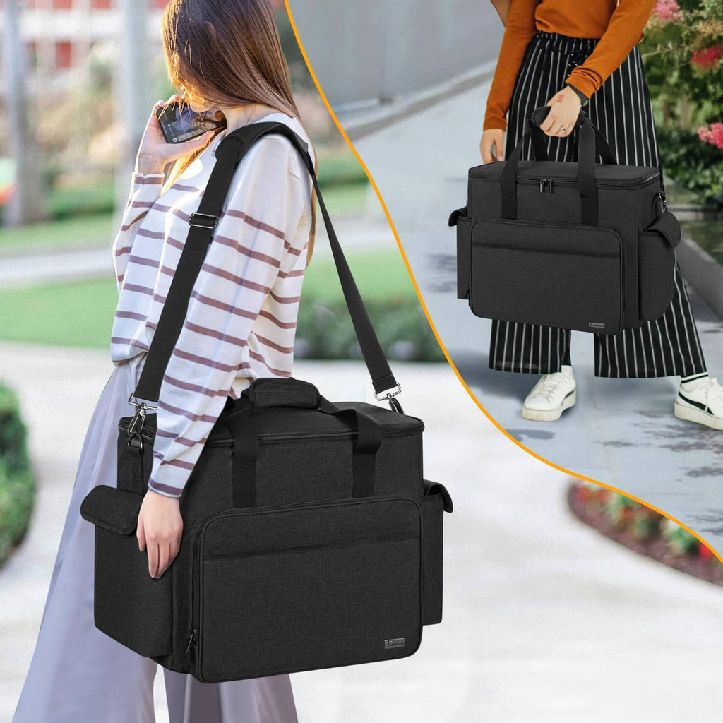 Black shoulder bag worn by a person, with zip top and front organizer pocket