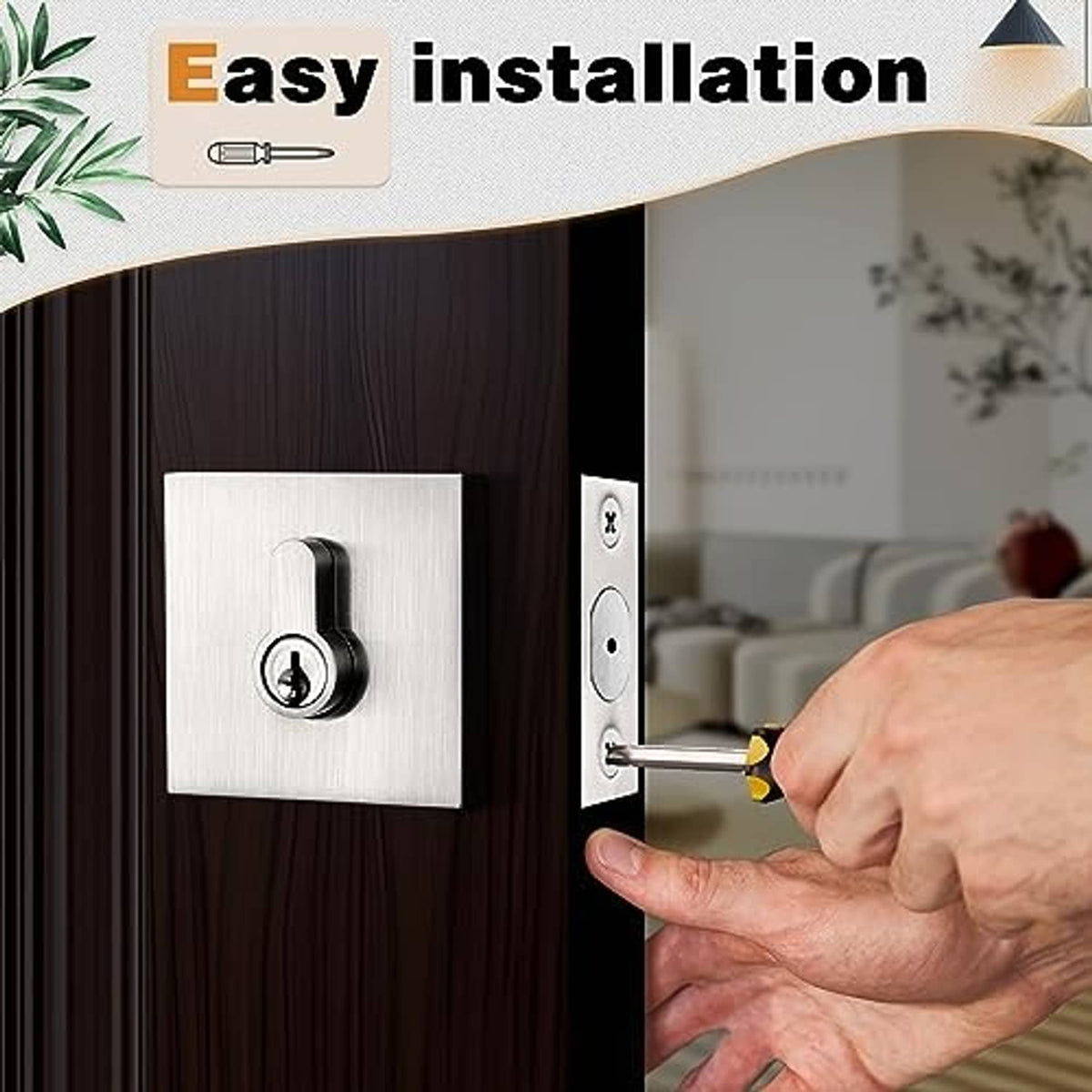 Brushed nickel double cylinder deadbolt on door with key being inserted