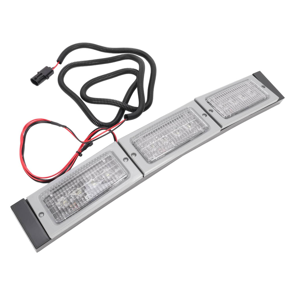 Angled view of 3-LED headlight light bar with wiring harness and red/black leads