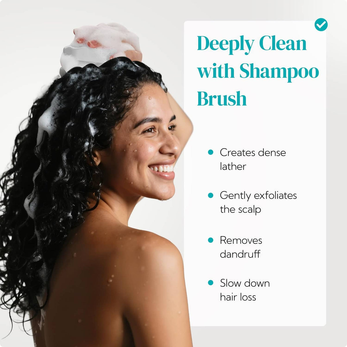 Shampoo scalp brush with white and purple bristles, used to cleanse and exfoliate.