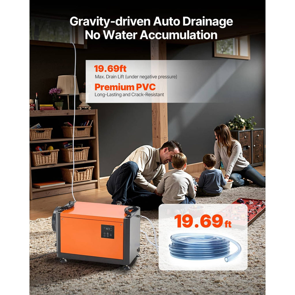 Commercial dehumidifier with orange front and pump hose, placed on floor