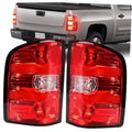 Pair of red tail light assemblies with clear lens sections and black bezels
