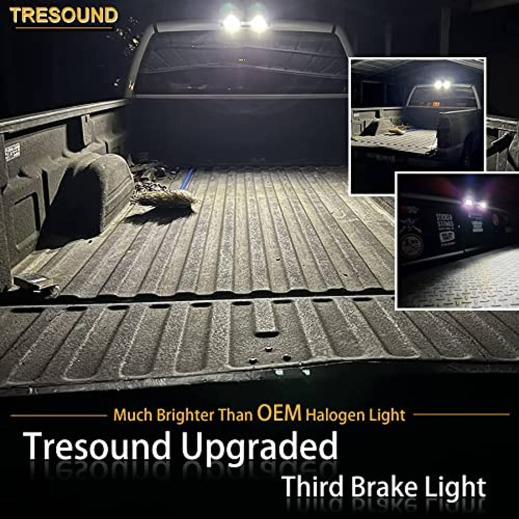 Upgraded third brake light glowing in a truck bed at night, showing bright red center