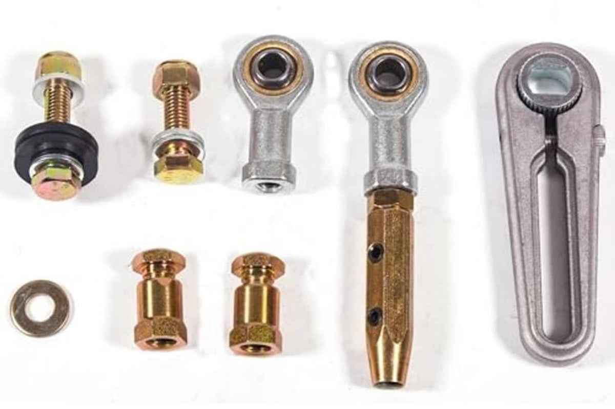 Transmission shift linkage hardware set with brass studs, pins, washers, and forked lever