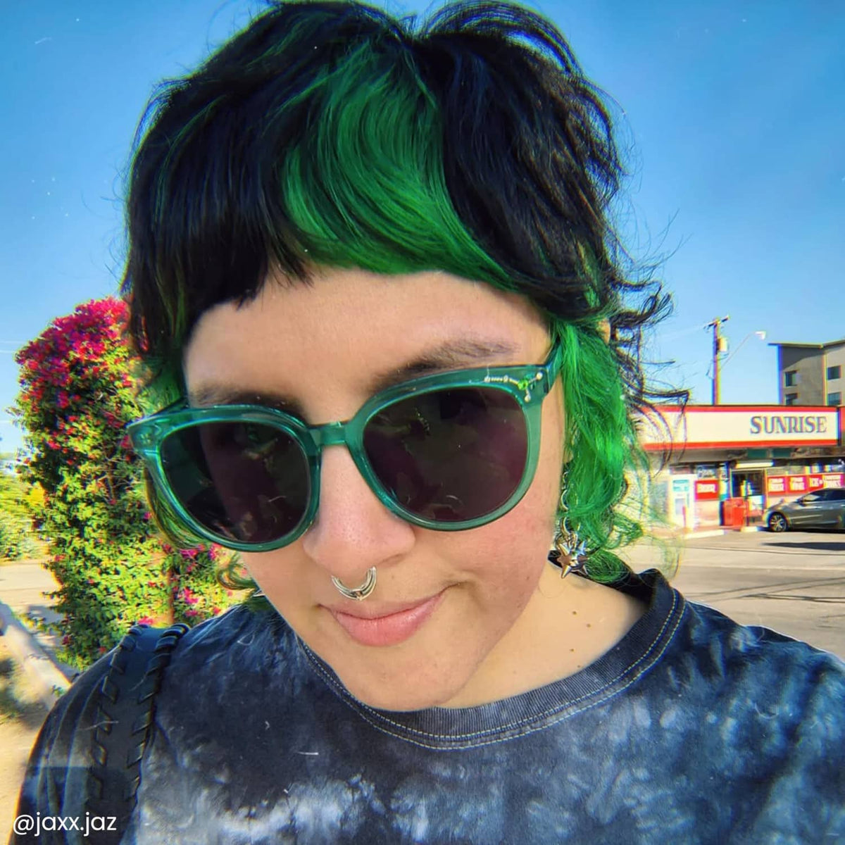 Iris green hair dye result on dark hair with green top and bangs