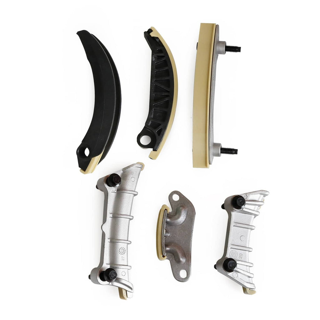 Timing chain guide components with black and tan pads and silver guide brackets