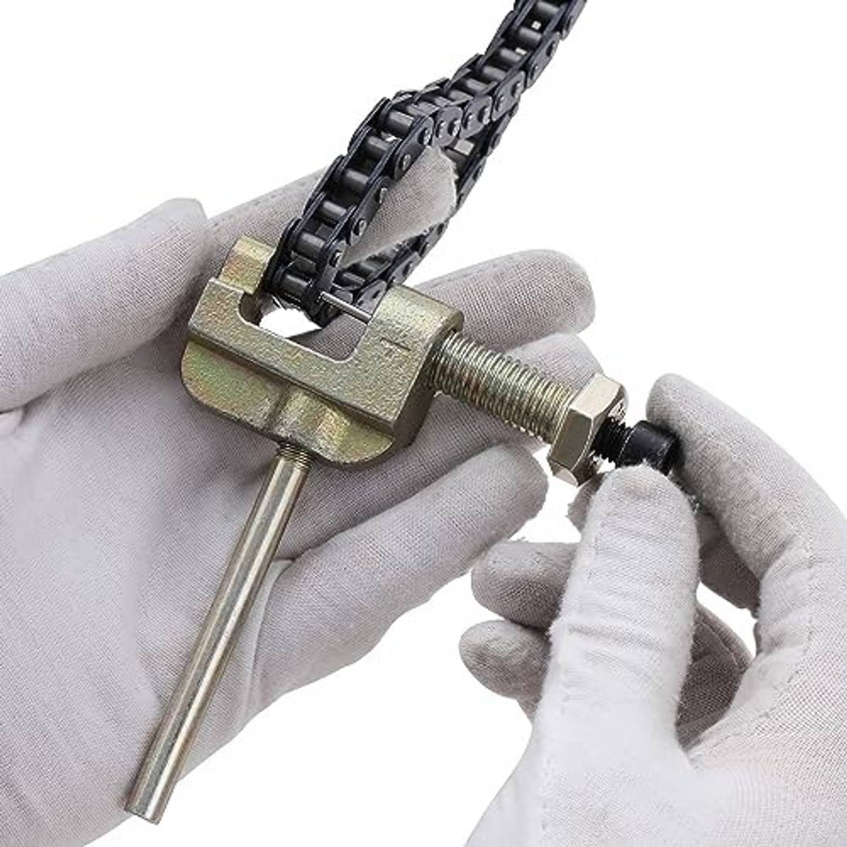 Link breaker tool holding a chain, with threaded screw and metal pin pusher