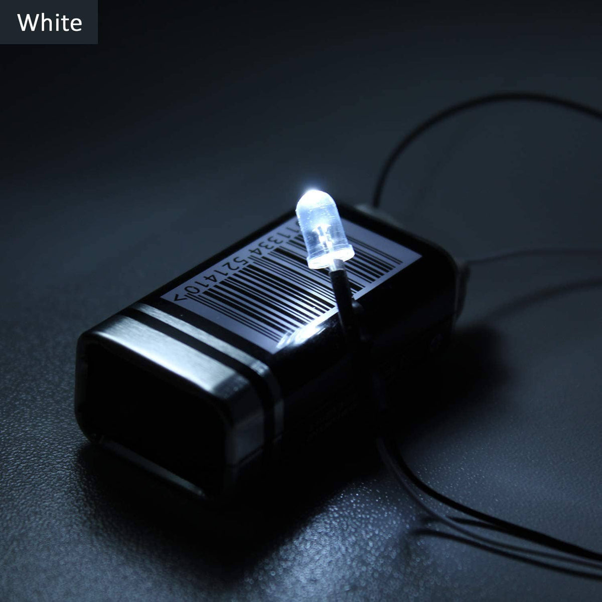 White 5mm LED diode on black power module with connected wires