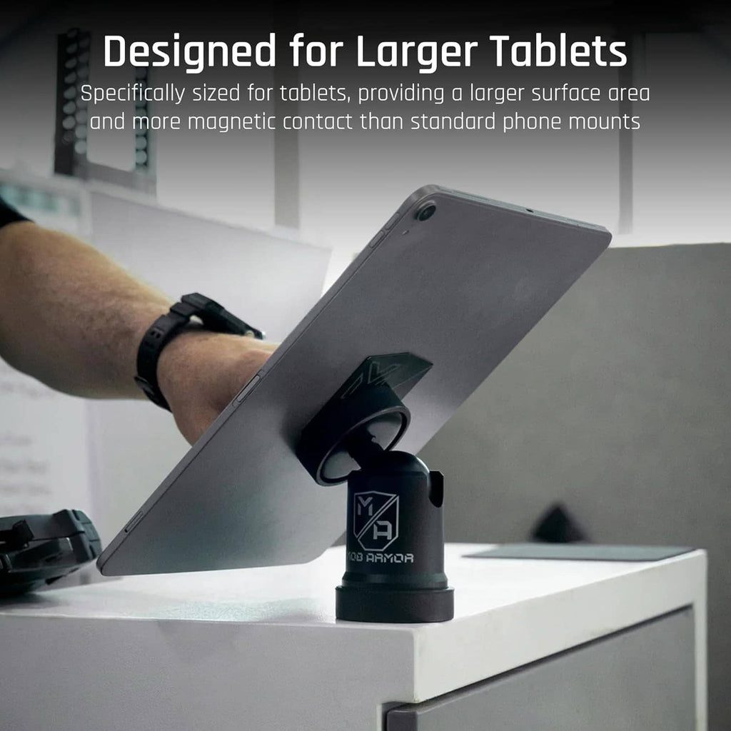 Magnetic tablet mount holding a large tablet with round magnet base and knob
