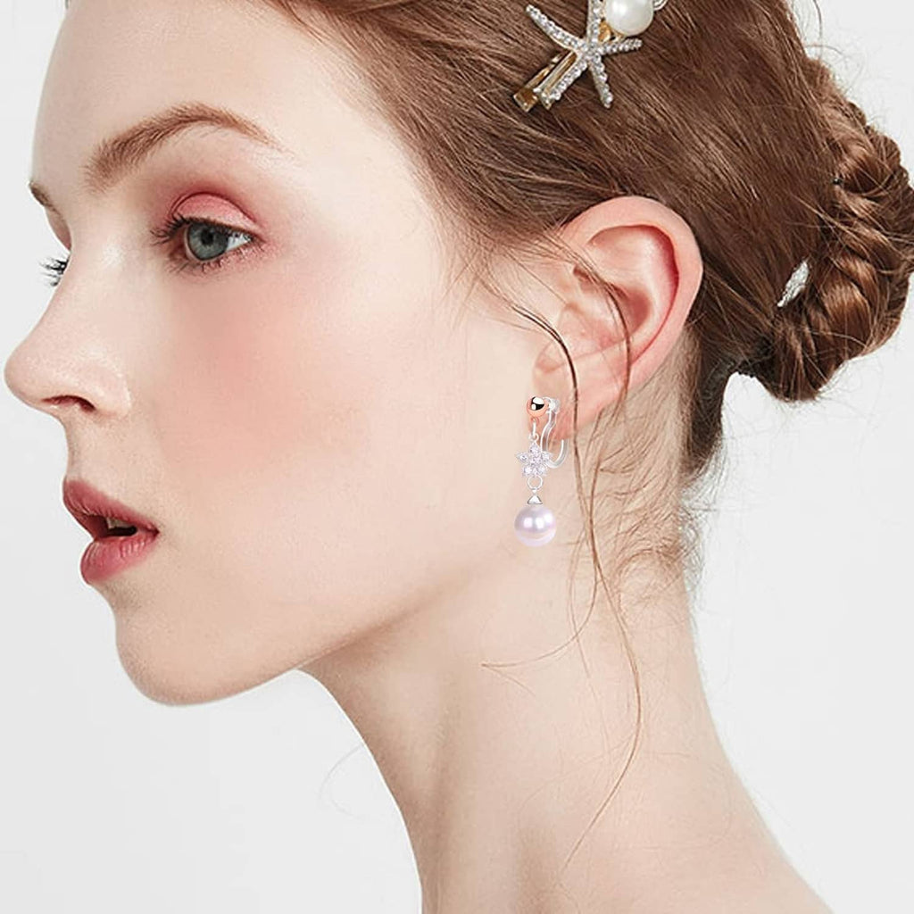 Pearl drop clip-on earring with clear hook, worn on ear