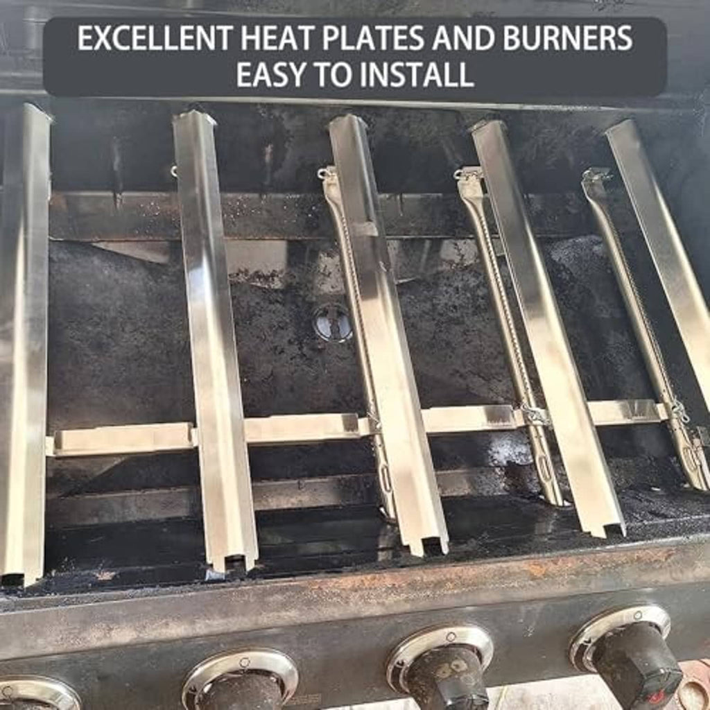 Stainless steel grill heat plates and burners installed inside firebox