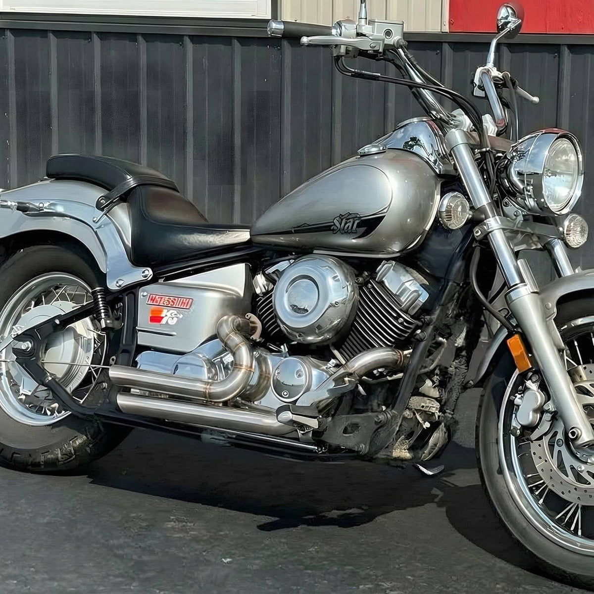 Dual chrome exhaust system with mufflers and headers on a motorcycle