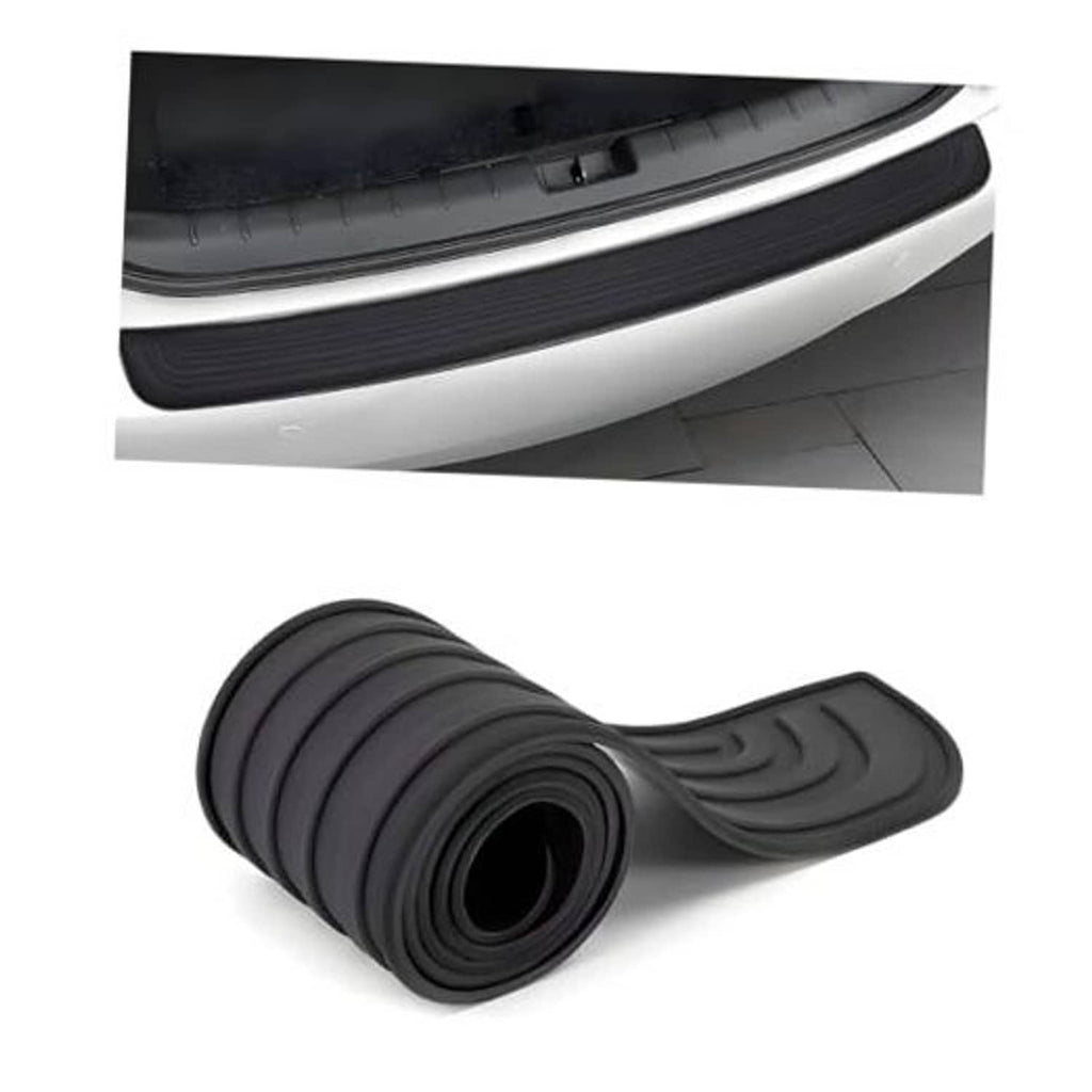 Black rear bumper protector strip fitted along the trunk door entry edge.