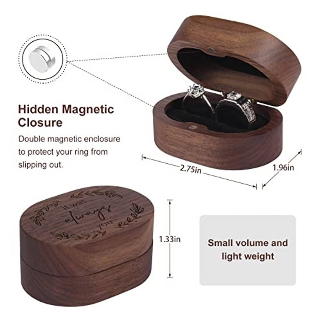 Wooden ring box with hidden magnetic closure, holding two rings in black interior