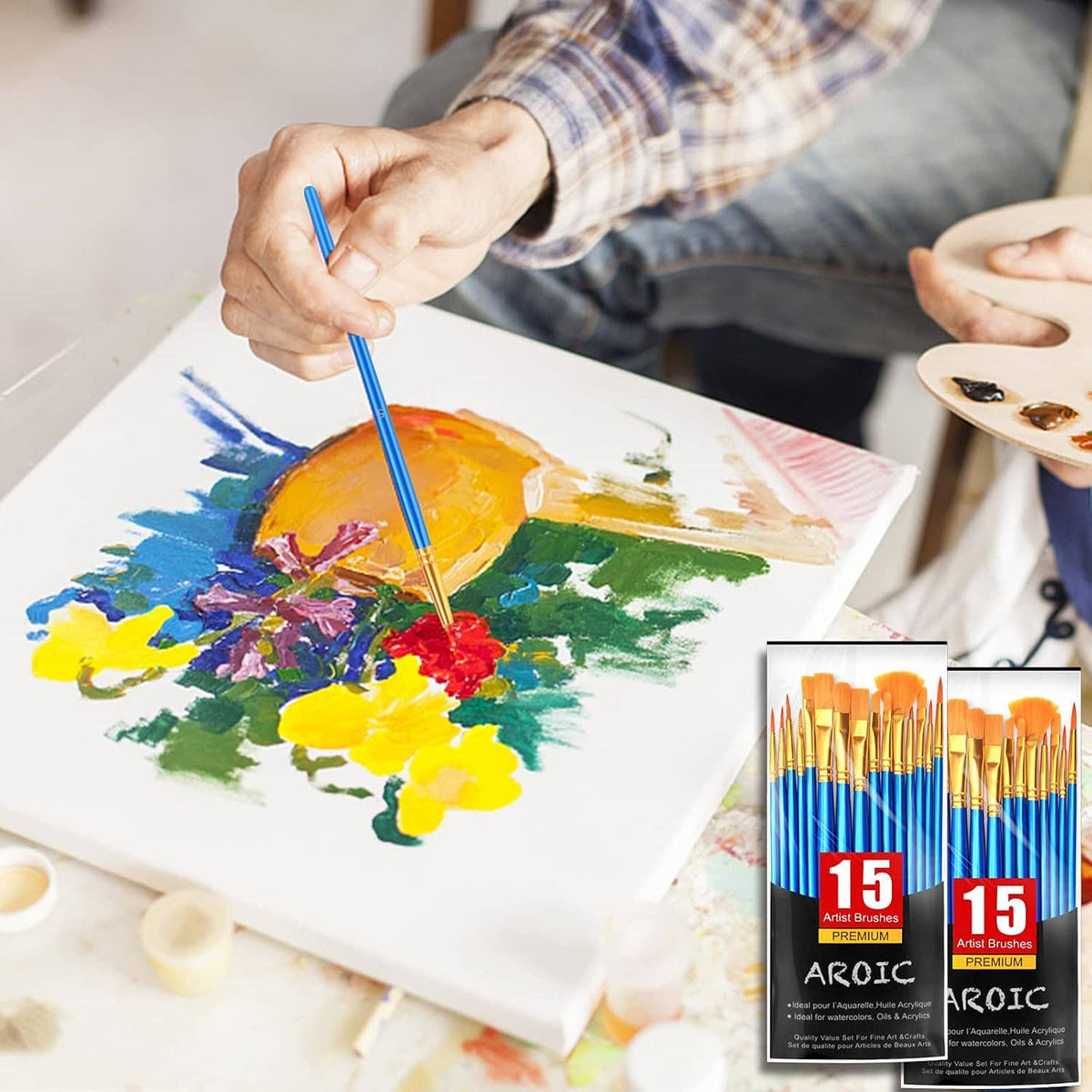 Acrylic paint brush set used for watercolor painting, with blue handles and orange bristles
