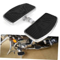 Motorcycle floorboard foot pegs installed with black tread boards and chrome trim