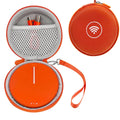 Orange round hard case with zipper, open lid showing gray mesh pocket and strap loop