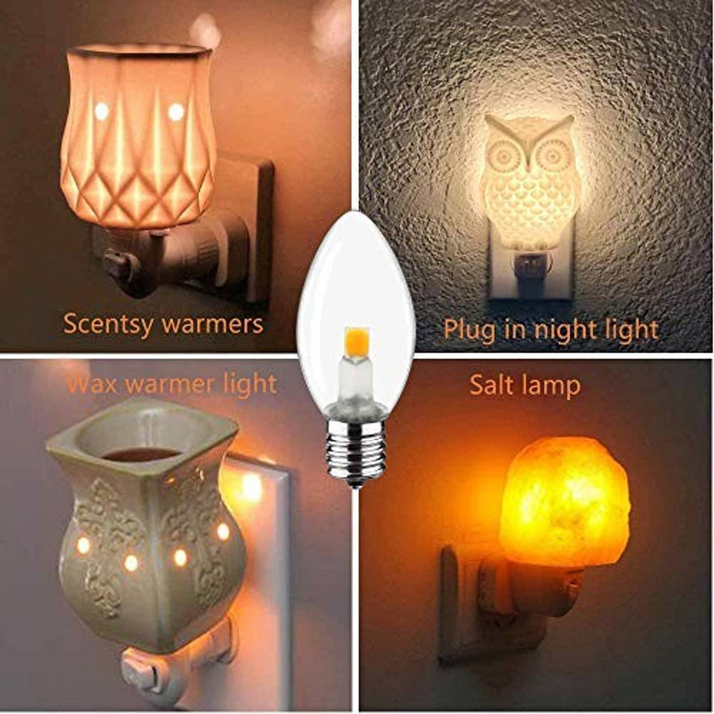Glowing clear teardrop LED night light bulb with candelabra E12 base