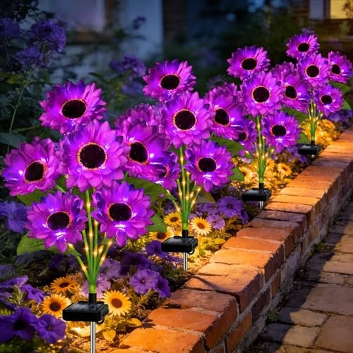 Purple solar sunflower lights lined along brick walkway, black stake bases
