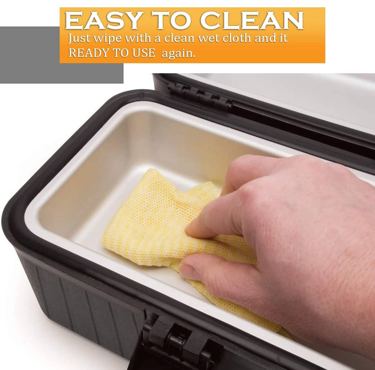 Open black heating lunch box interior with wipe-clean surface and cloth