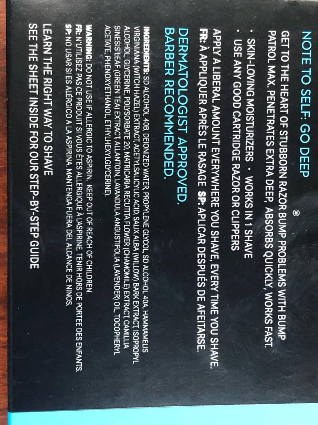 Back label text close-up on Bump Patrol aftershave treatment bottle
