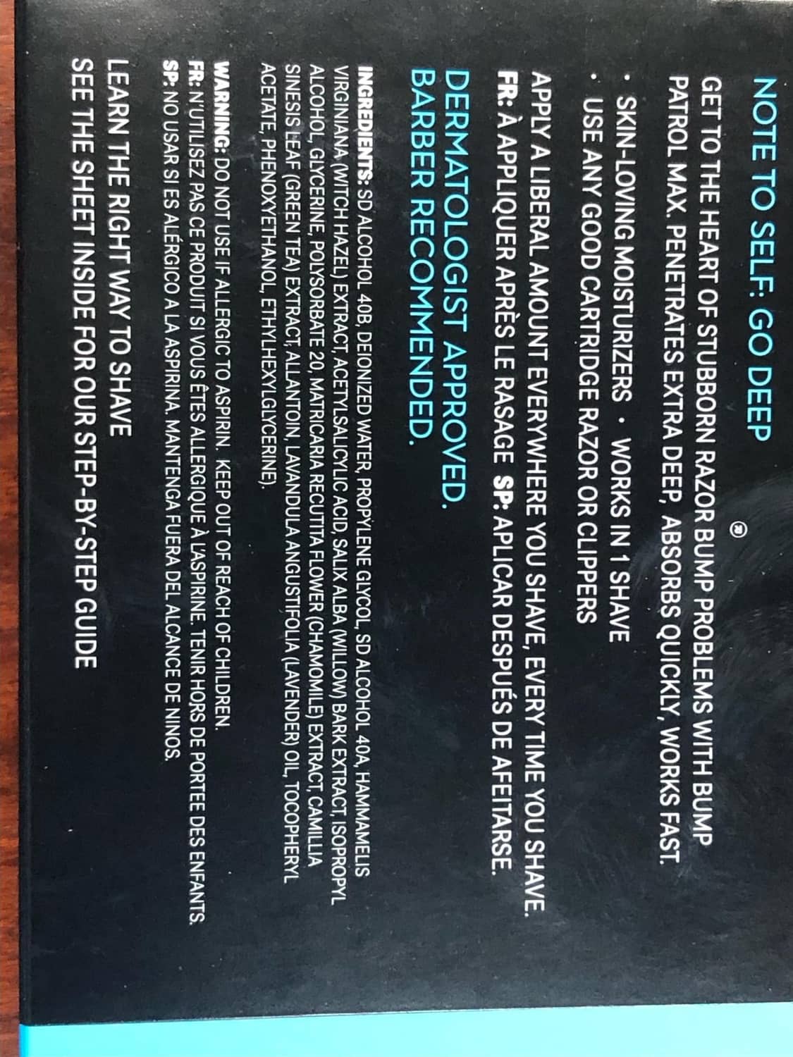 Back label text close-up on Bump Patrol aftershave treatment bottle