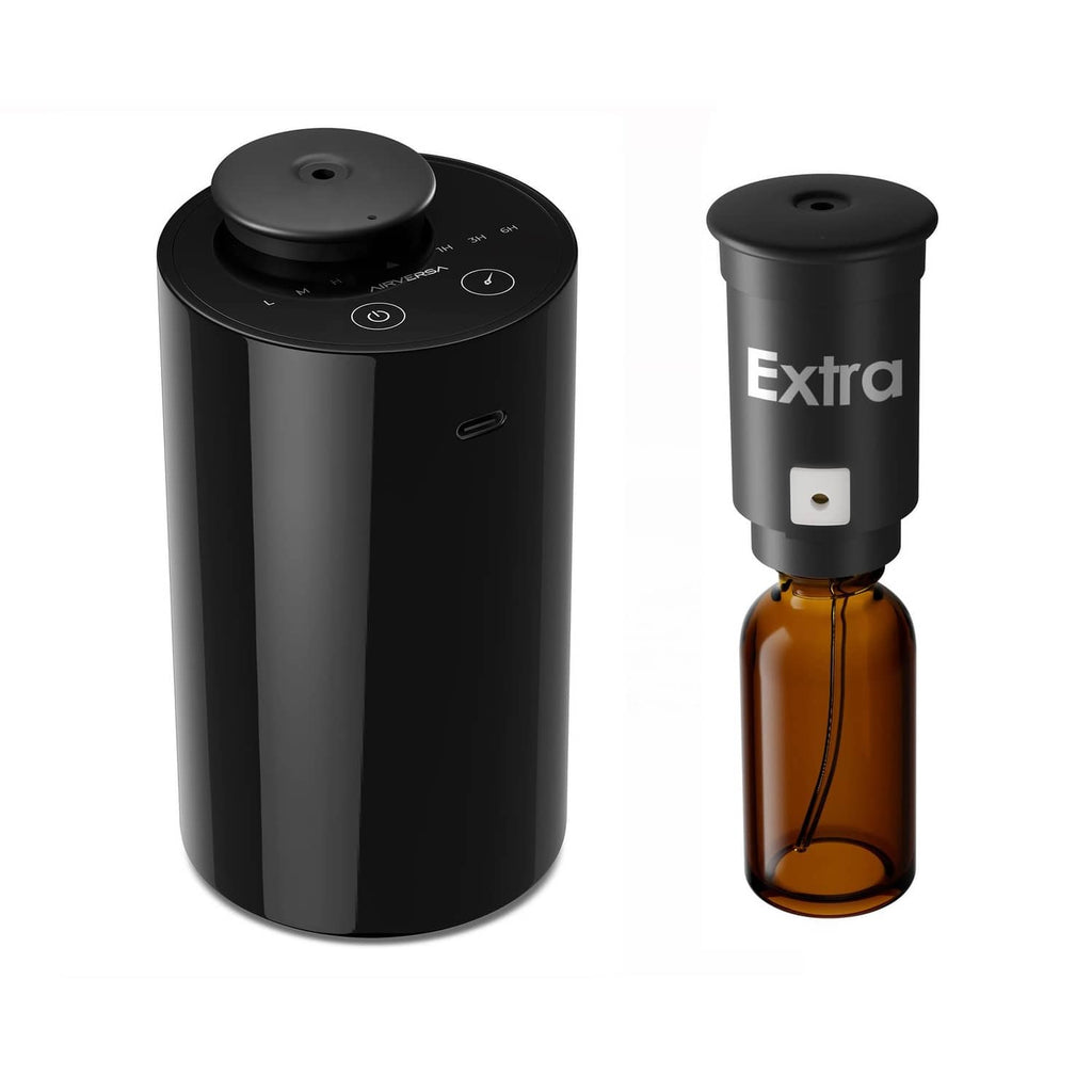 Black waterless essential oil diffuser with top control button