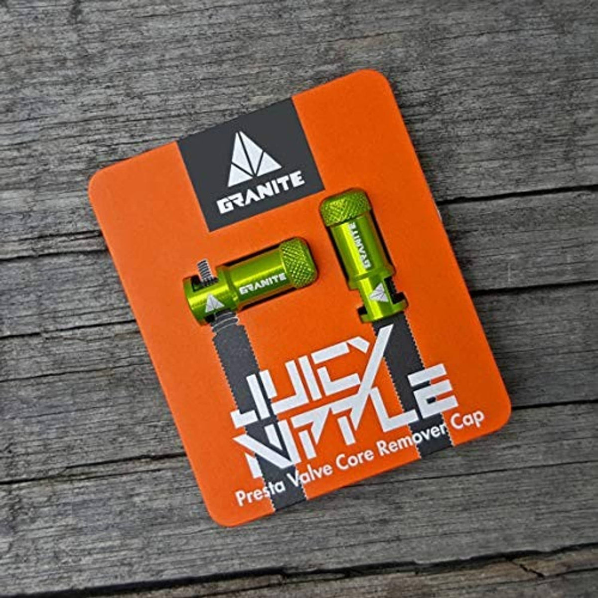 Packaging card showing valve core remover caps, including blue and green options.