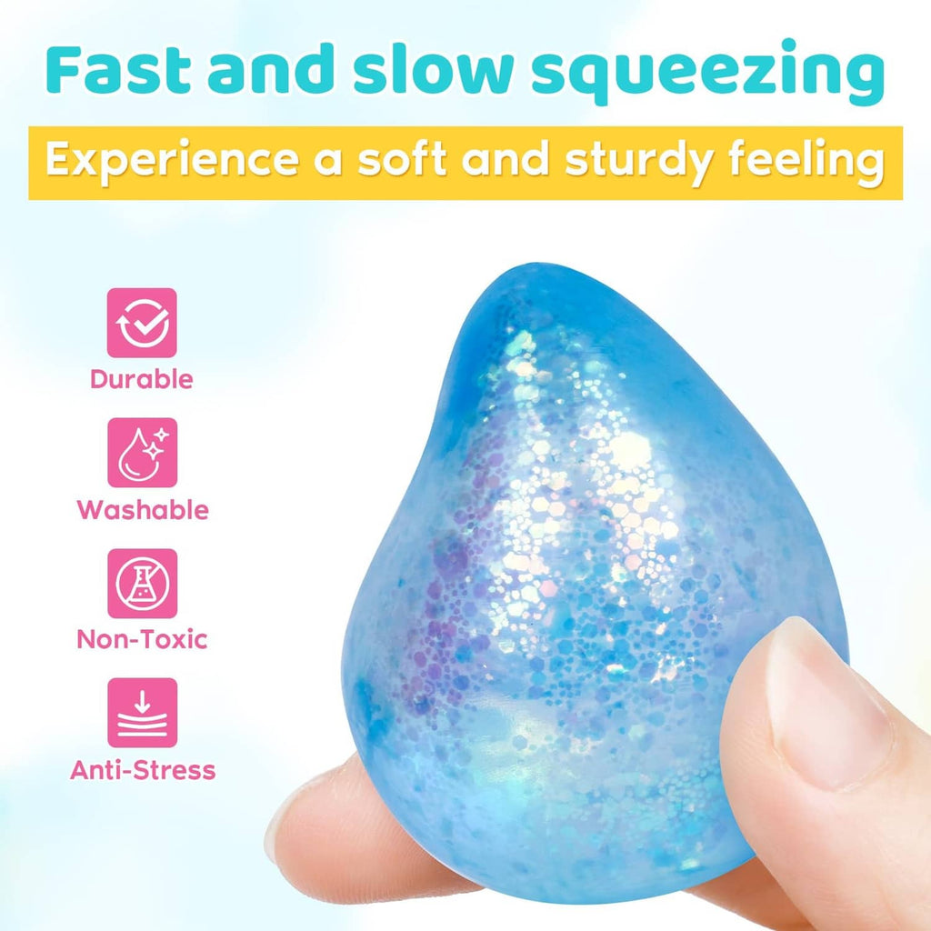 Blue glitter water-droplet squishy stress ball squeezed between fingers.