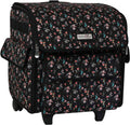 Black floral rolling serger machine tote with front flap, zipper, and side handle